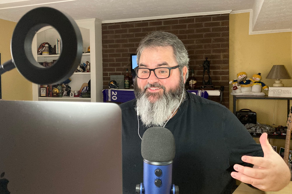 Jason Falls recording a podcast