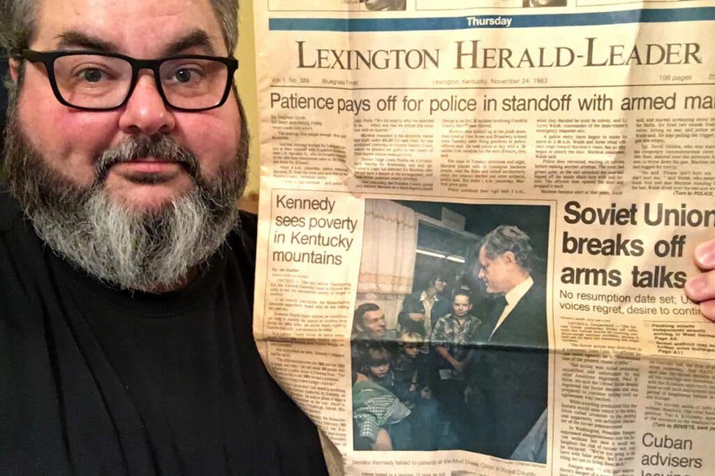 Jason Falls with his Ted Kennedy Newspaper