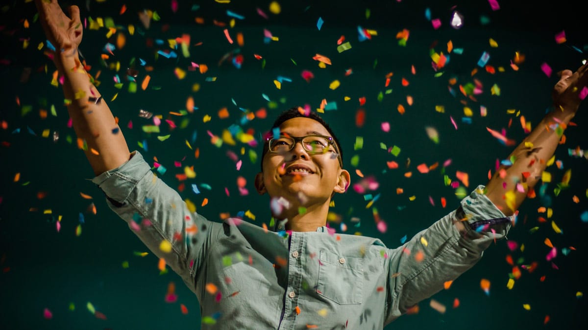 Man with Confetti Celebrating